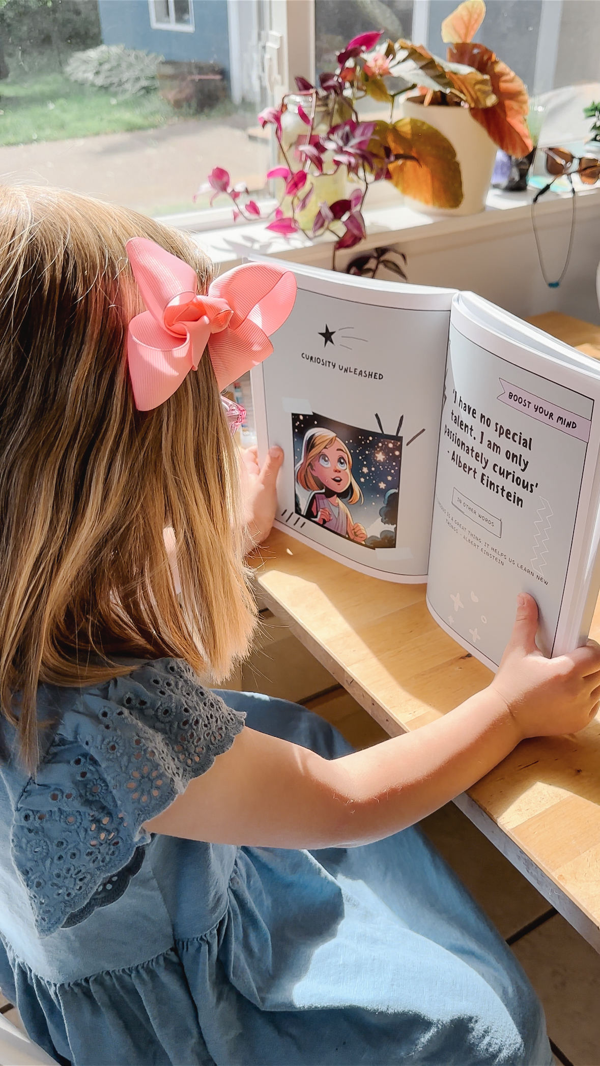 Child holding their personalised storybook